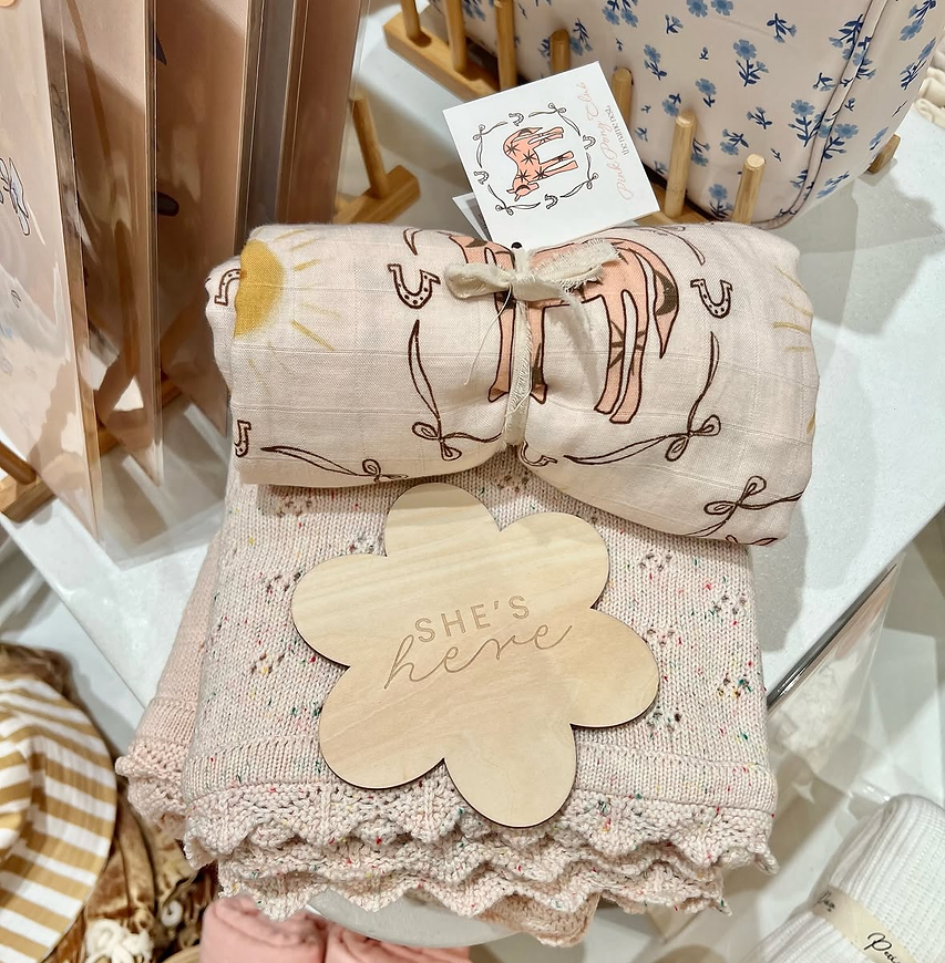 She’s Here Flower Plaque